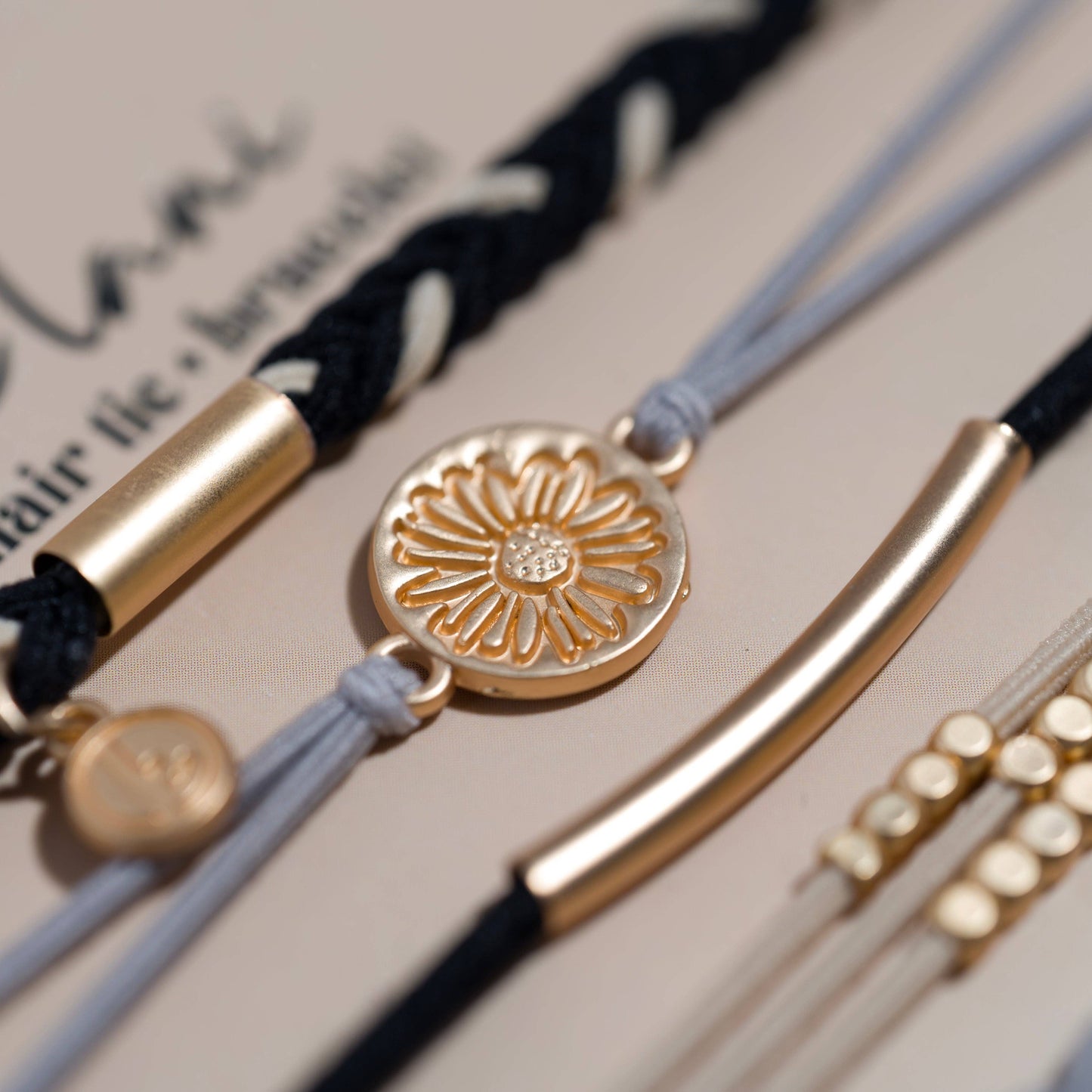 K'lani "Inspire" Grey and Black with Gold Flower Accent Hair Tie Bracelets